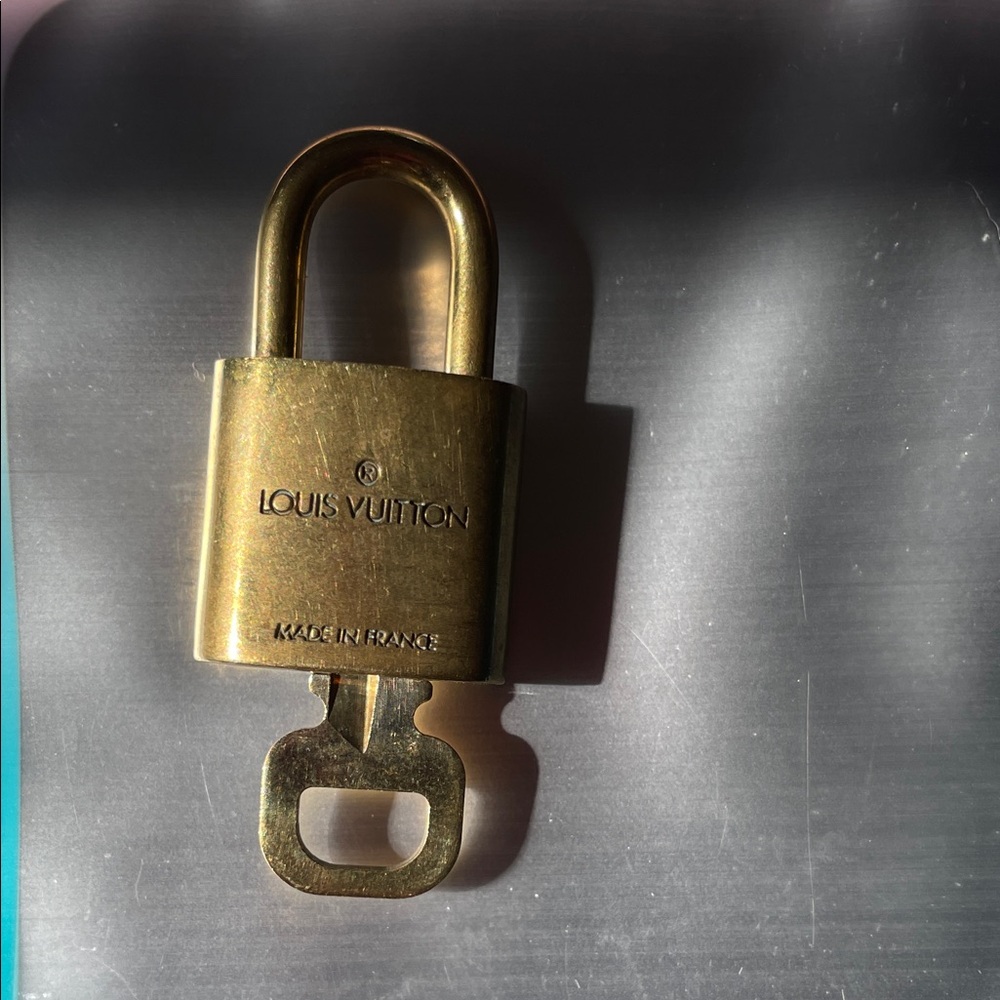 Louis Vuitton lock and key number 304